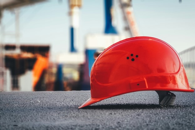 Red hard hat on a construction site