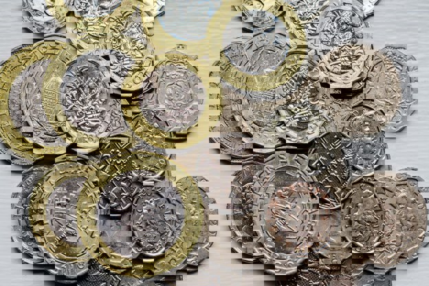 UK money coins displayed on white background