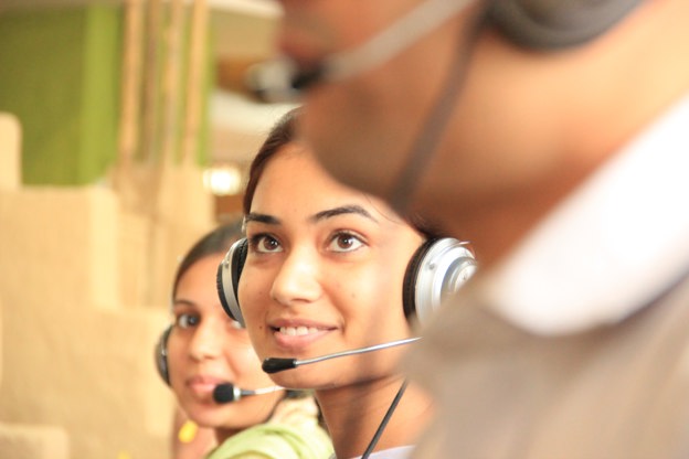 Three customer service agents on the phone